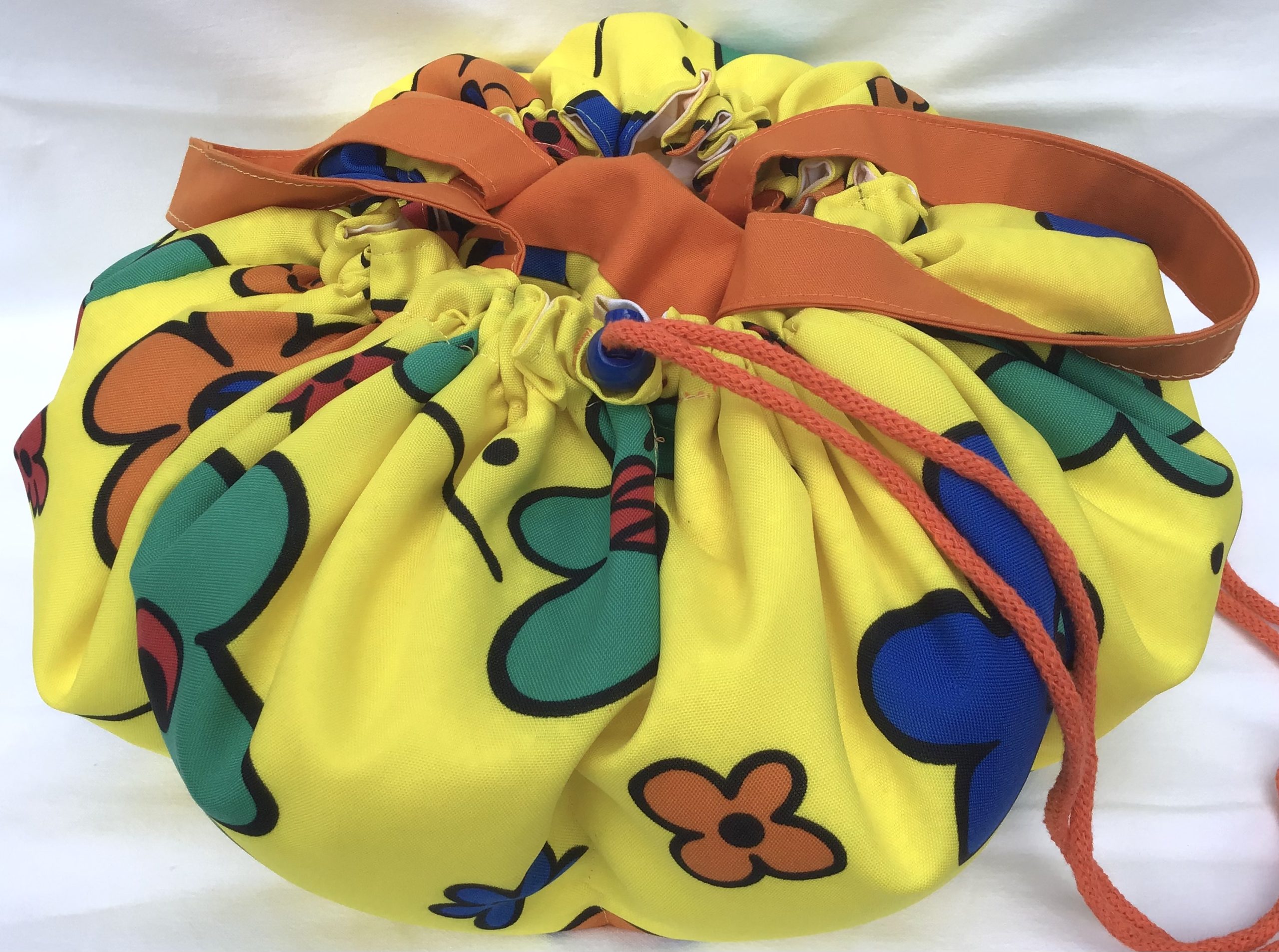 MiniKOsCHino Gelb mit Blüten
